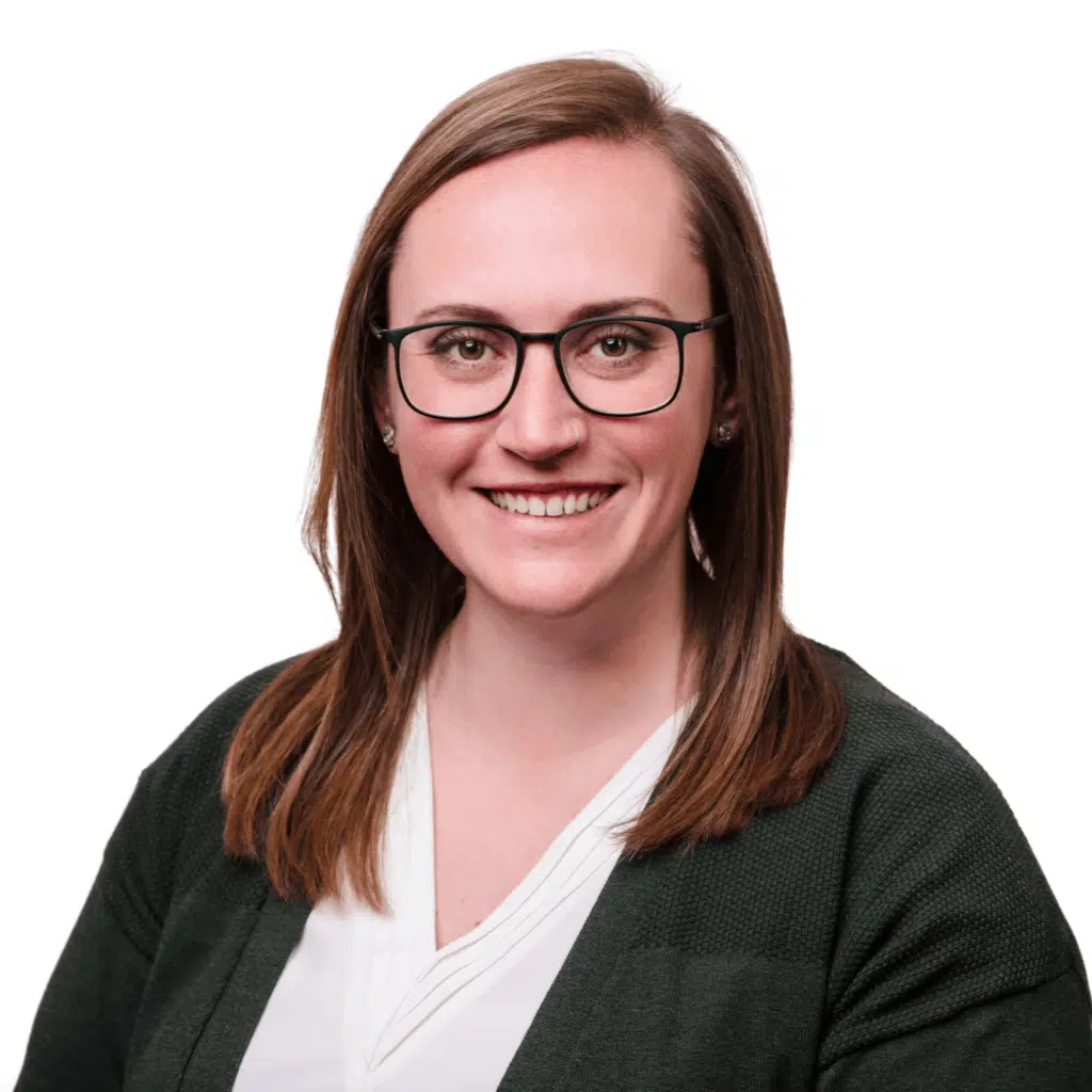 Headshot of Jordan Everette, a bookkeeping and payroll specialist at Jones, Covey, and Company, based in Washington, NC. Jordan assists local businesses with accurate financial records and payroll management, ensuring efficiency and compliance. She is smiling in a white blouse and dark green cardigan against a white background.
